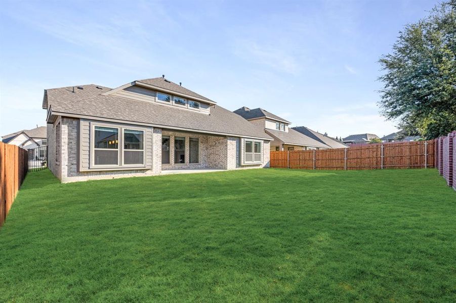 Exterior details and patio area of a home in The Enclave at Parks of Aledo, Aledo (Image 4). Exterior details and patio area of a home in The Enclave at Parks of Aledo, Aledo (Image 4).