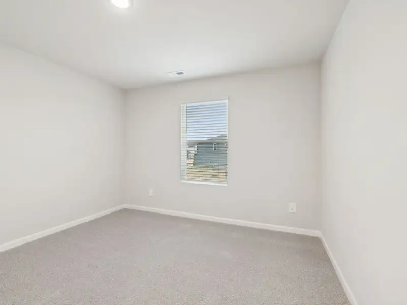 Spacious, unfurnished interior of a new home in Country Lane - Signature Series, Clayton (Image 20).