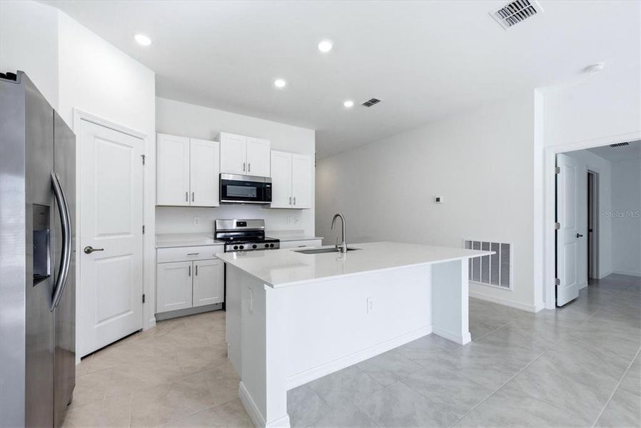 Furnished interior view inside a new home in Rotonda Lakes, Rotonda West (Image 12).