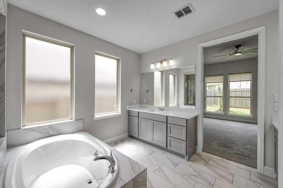 Furnished interior view inside a new home in The Woodlands Hills, Willis (Image 30).