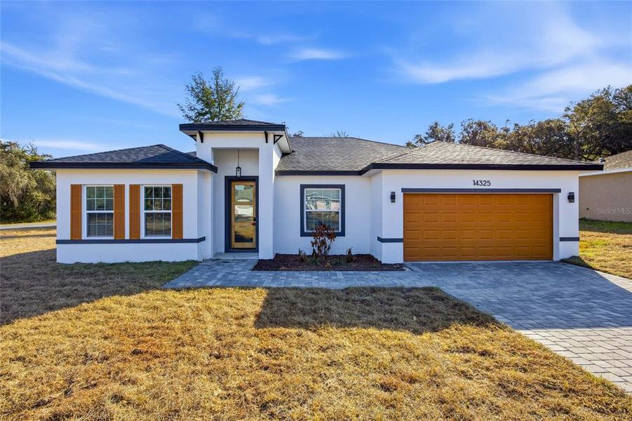 Front exterior of a new home in , Ocala, FL, highlighting curb appeal (Image 19). Front exterior of a new home in , Ocala, FL, highlighting curb appeal (Image 19).