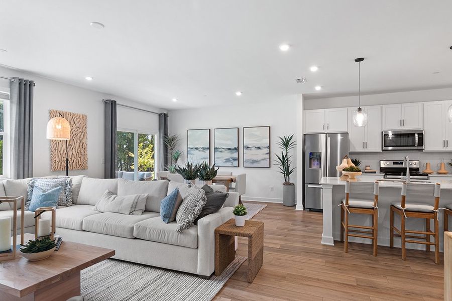 A living room with a couch and a table.