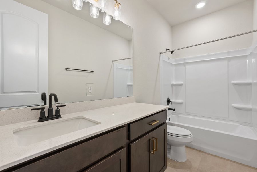 Representative furnished interior of a home built from the Texoma by Ashton Woods in The Colony 50s, Bastrop (Image 7).