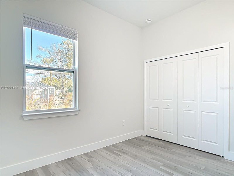 Spacious, unfurnished interior of a new home in , Port Charlotte (Image 16).