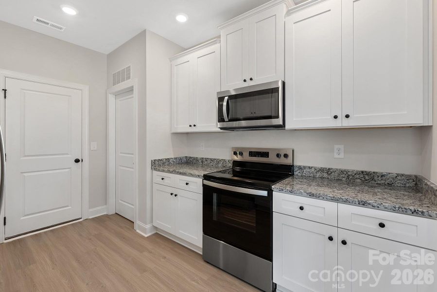 Furnished interior view inside a new home in Willow Estates, Shelby (Image 4).