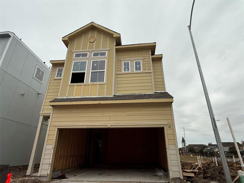 Three story home with 2 beds, 2.5 baths, and 2 car garage