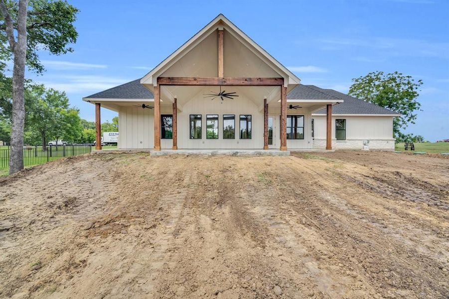 View of front of home with ceiling fan