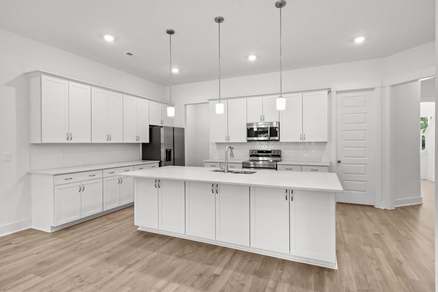 Furnished interior view inside a new home in Long Bay Golf Club, Longs (Image 5).