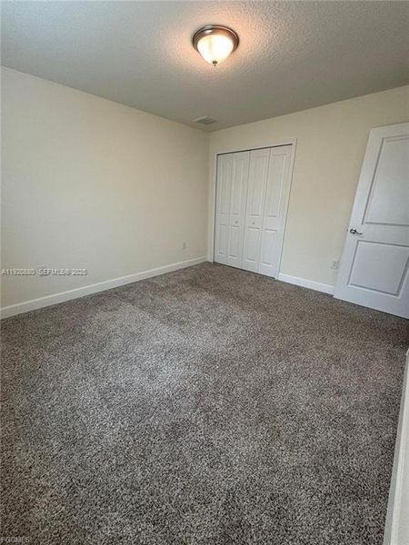 Spacious, unfurnished interior of a new home in , Lehigh Acres (Image 13).
