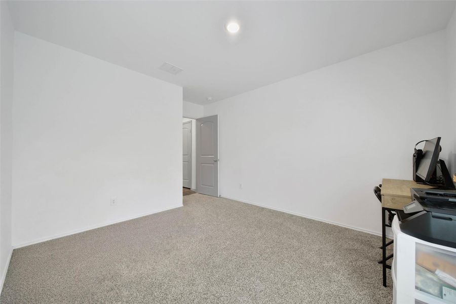 Spacious, unfurnished interior of a new home in The Canopies, Splendora (Image 20).