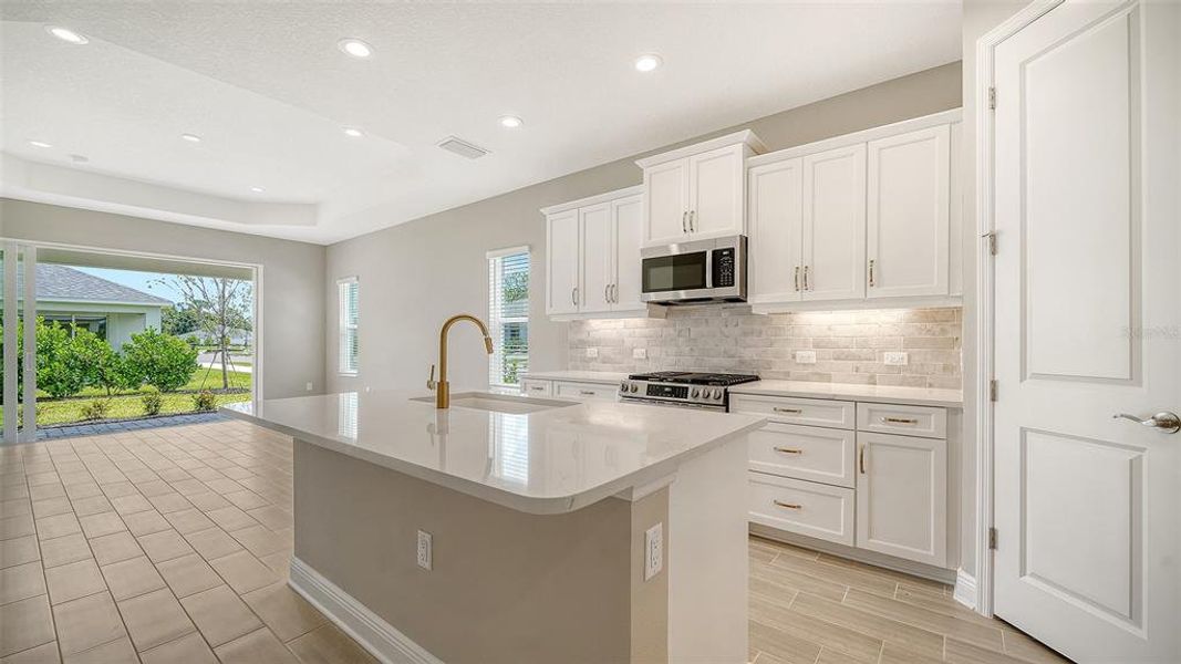Furnished interior view inside a new home in Wildleaf at North River Ranch, Parrish (Image 12).