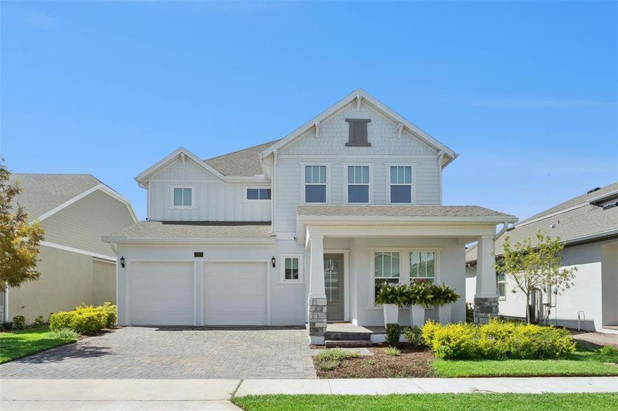 Front exterior of a new home in , Orlando, FL, highlighting curb appeal (Image 1). Front exterior of a new home in , Orlando, FL, highlighting curb appeal (Image 1).