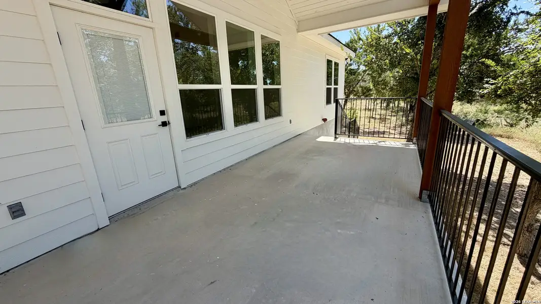 Exterior details and patio area of a home in , Bulverde (Image 3).