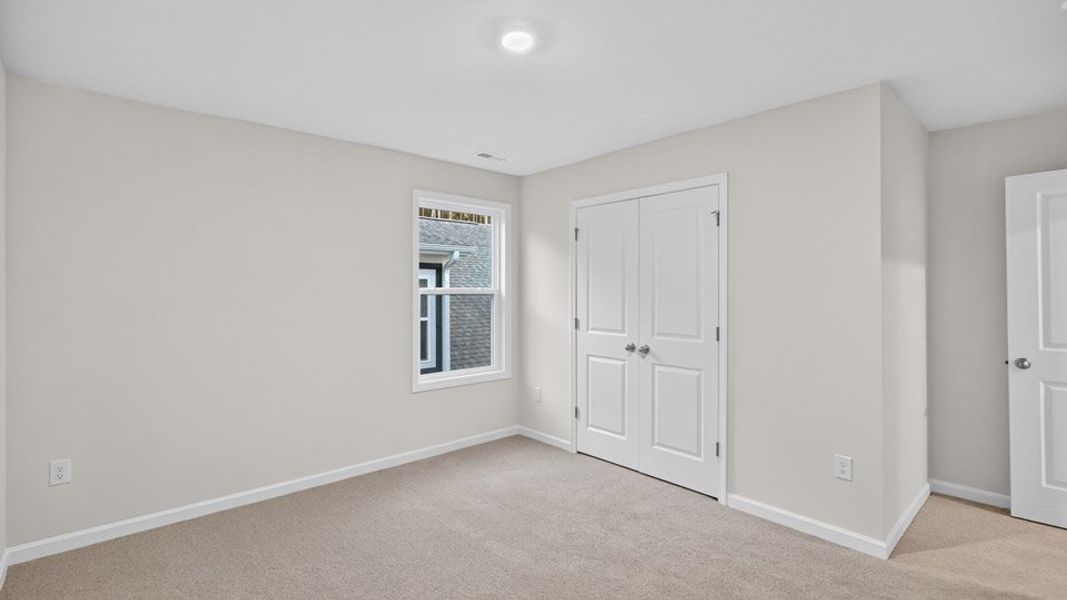 Representative unfurnished interior of a home built from the LAWSON by D.R. Horton in Horton Park, Apex (Image 18).