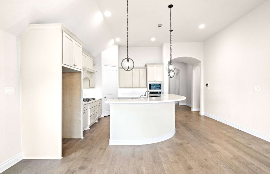 Representative furnished interior of a home built from the 2406 by Ravenna Homes in The Highlands 55′, Porter (Image 9).
