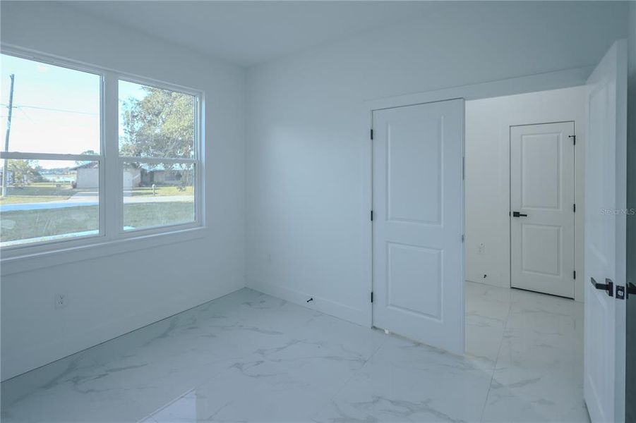 Spacious, unfurnished interior of a new home in , Deltona (Image 18).