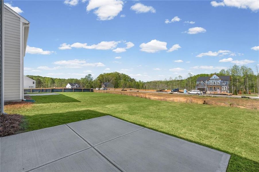 Exterior details and patio area of a home in Twin Lakes, Hoschton (Image 3).