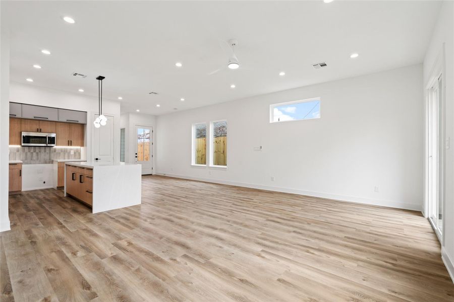 Airy open-concept layout with room to relax, dine, and entertain.