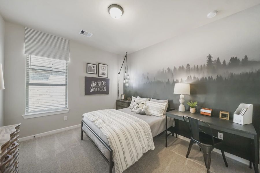 Representative furnished interior of a home built from the Bradford by Chesmar Homes in Meridiana 50's, Manvel (Image 12).
