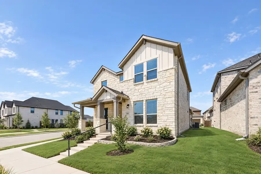 Front exterior of a new home in Cross Creek Meadows, Celina, TX, highlighting curb appeal (Image 18).
