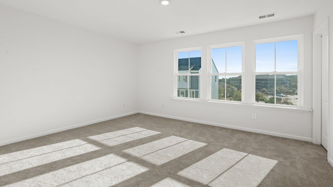 Furnished interior view inside a new home in Seabreeze Crossing, Little River (Image 11).