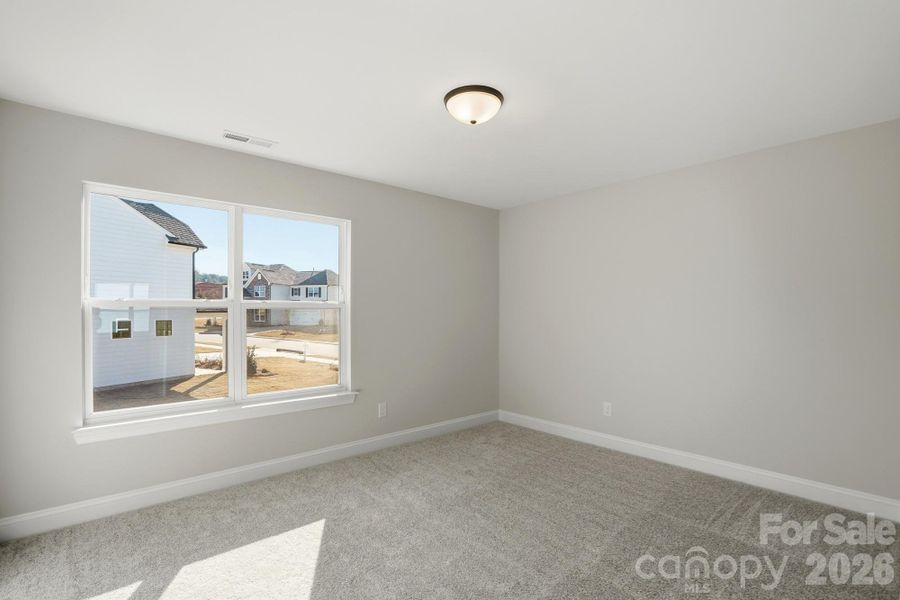 Spacious, unfurnished interior of a new home in Carrington, Stanley (Image 20).