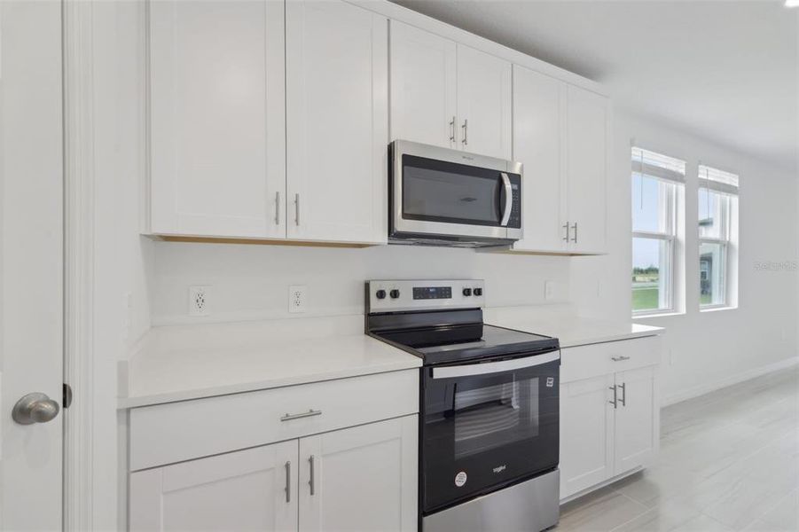 Furnished interior view inside a new home in Springs at Lake Alfred - Signature Series, Lake Alfred (Image 9).