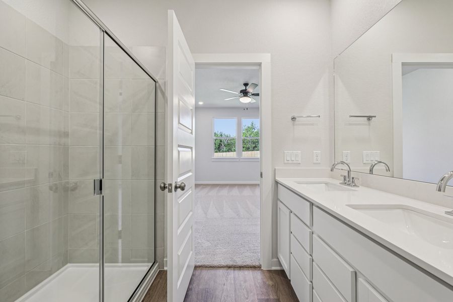 A bathroom with a glass shower.