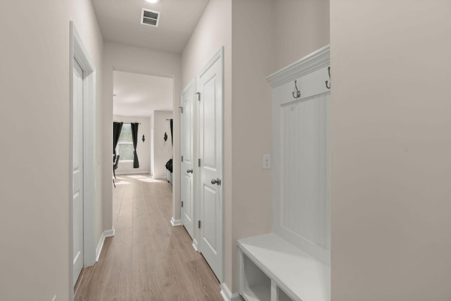 Spacious, unfurnished interior of a new home in Jasmine Point at Lakes of Cane Bay, Summerville (Image 22).