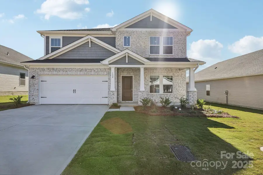 Front exterior of a new home in Oxford Station, Salisbury, NC, highlighting curb appeal (Image 1).