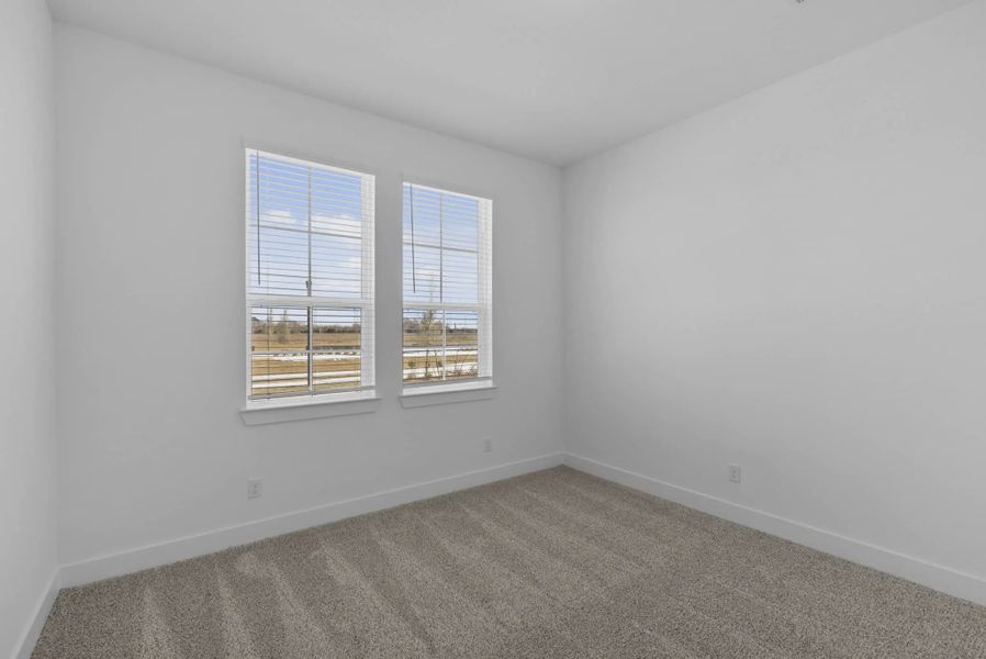 Representative unfurnished interior of a home built from the Nicklaus by Chesmar Homes in Riceland Alley Loads, Mont Belvieu (Image 72).