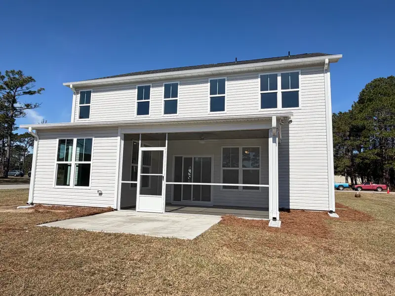 Exterior details and patio area of a home in , Shallotte (Image 4).