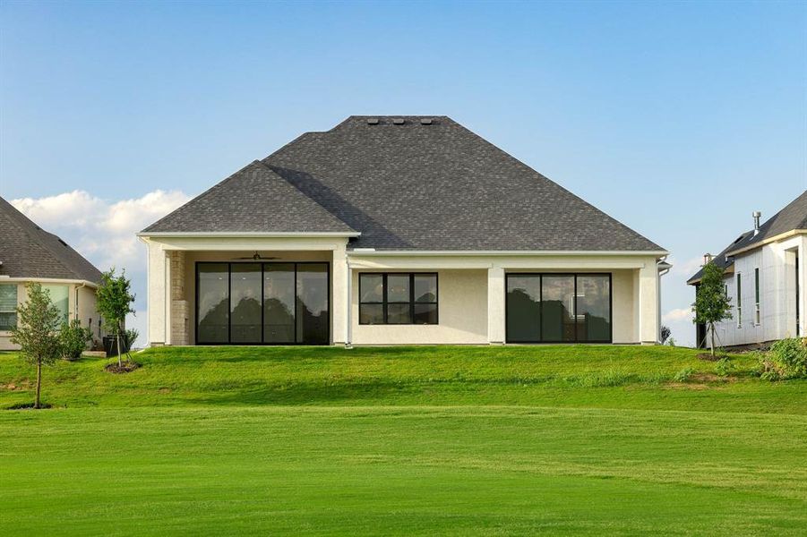 Front exterior of a new home in Robson Ranch Texas, Denton, TX, highlighting curb appeal (Image 2). Front exterior of a new home in Robson Ranch Texas, Denton, TX, highlighting curb appeal (Image 2).