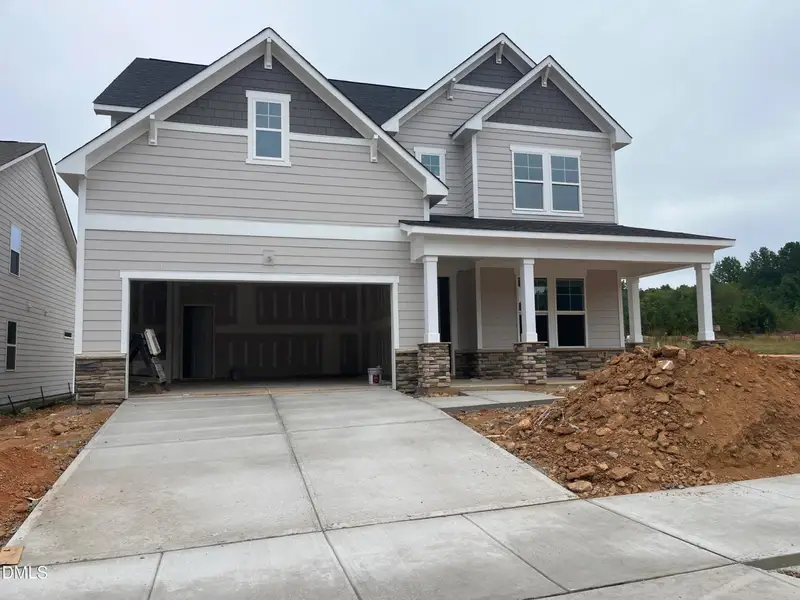 Front exterior of a new home in Sage on North Main, Wake Forest, NC, highlighting curb appeal (Image 19).