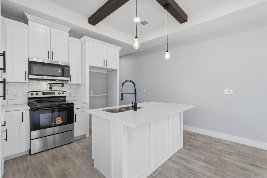 Furnished interior view inside a new home in , Willis (Image 10).