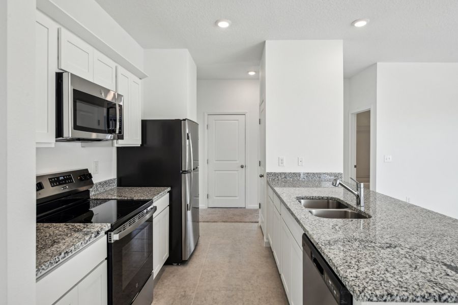Representative furnished interior of a home built from the Larissa by Starlight Homes in Wilson's Walk, Clayton (Image 7).
