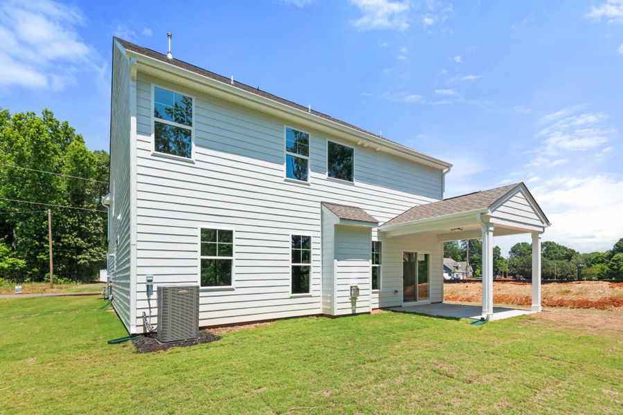 Exterior details and patio area of a home in Fiddler's Ridge, Advance (Image 24).