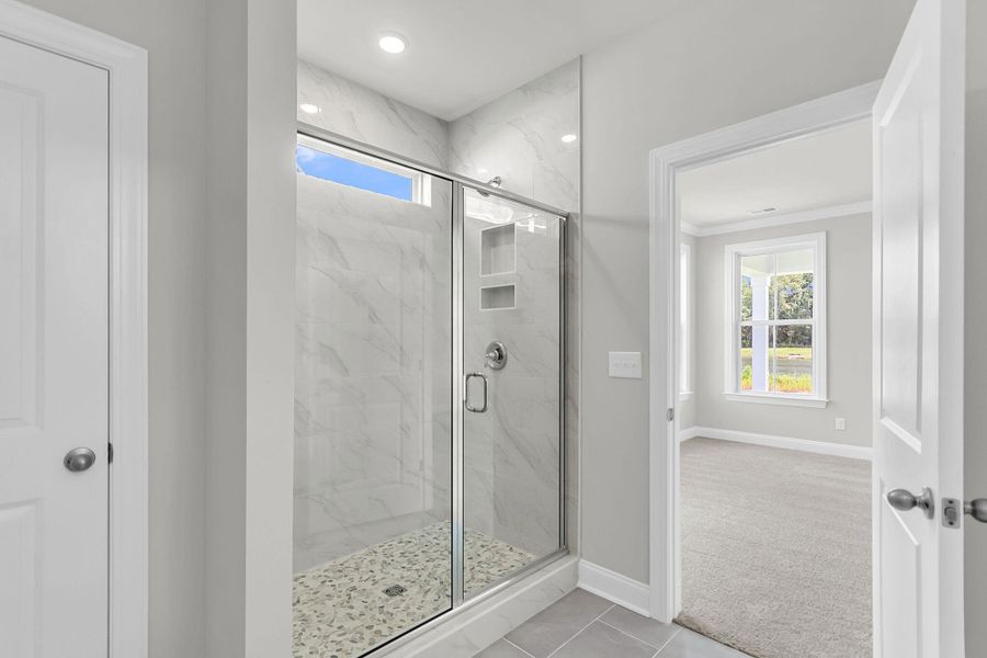 Furnished interior view inside a new home in Tidewater at Lakes of Cane Bay, Summerville (Image 12).
