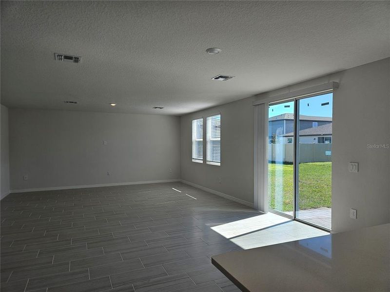 Spacious, unfurnished interior of a new home in Lawson Dunes - Signature Series, Haines City (Image 40).