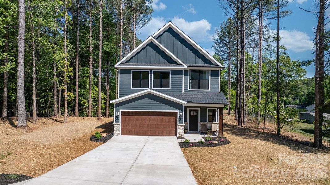Front exterior of a new home in , Hickory, NC, highlighting curb appeal (Image 31).