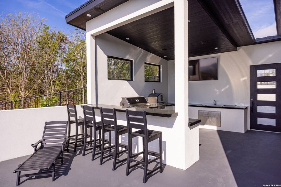 Exterior details and patio area of a home in , Kerrville (Image 43).