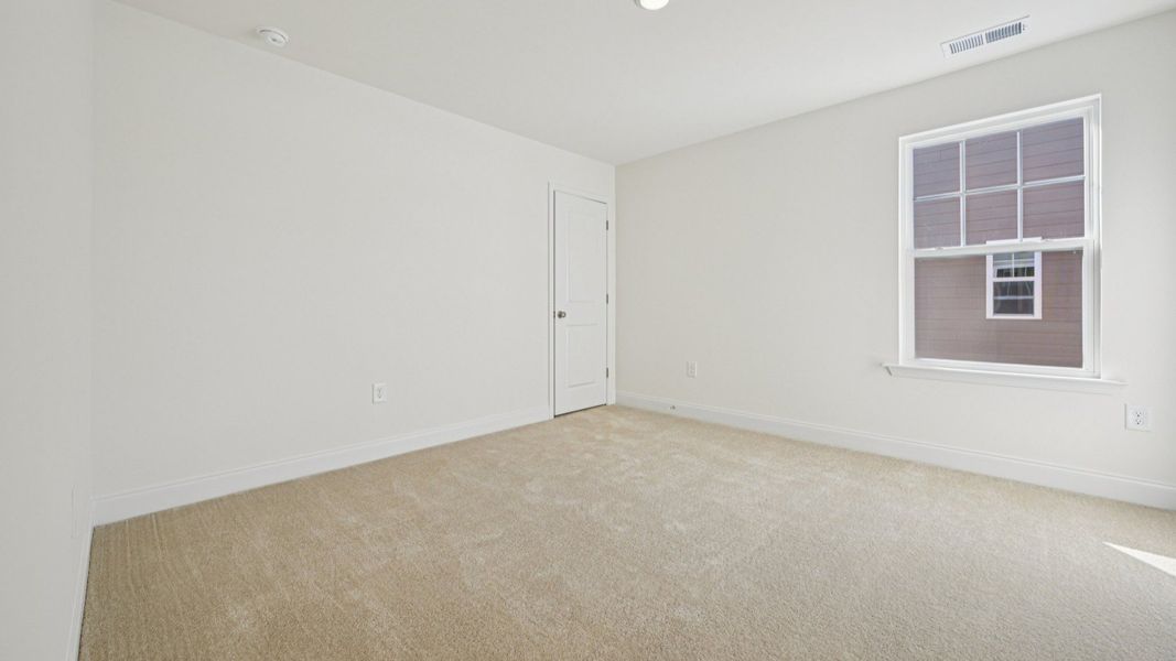 Representative furnished interior of a home built from the Wagener by DRB Homes in Station Pointe, Angier (Image 35).