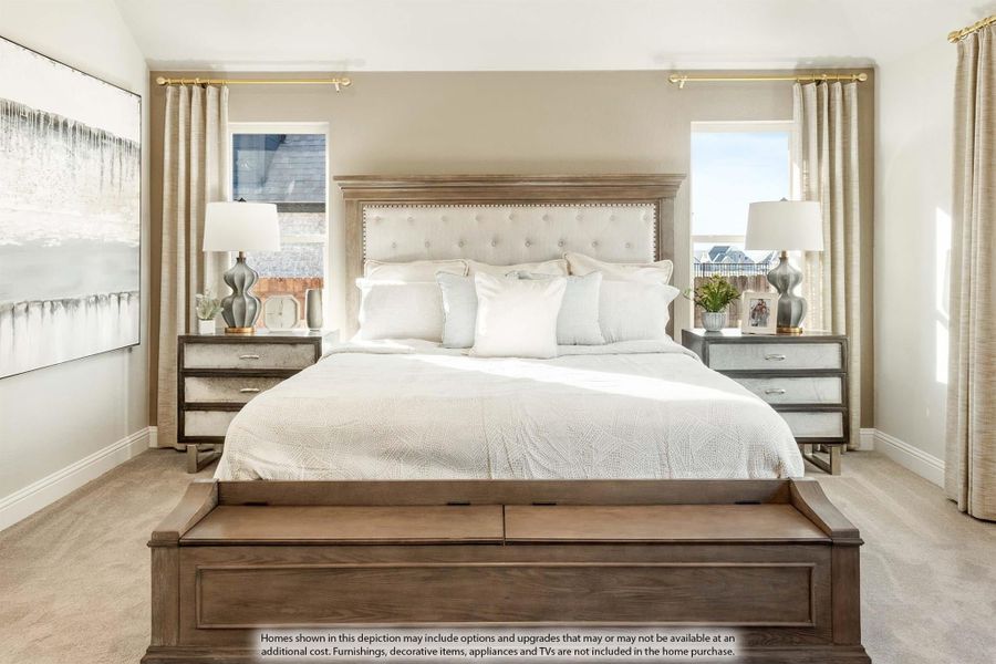 Master bedroom with tufted upholstered headboard, wood storage bed frame, mirrored nightstands, and neutral carpet flooring