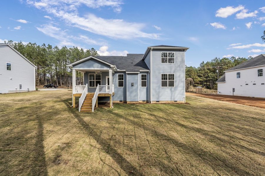 Exterior details and patio area of a home in Landing at Pine Lake, Anderson (Image 3).