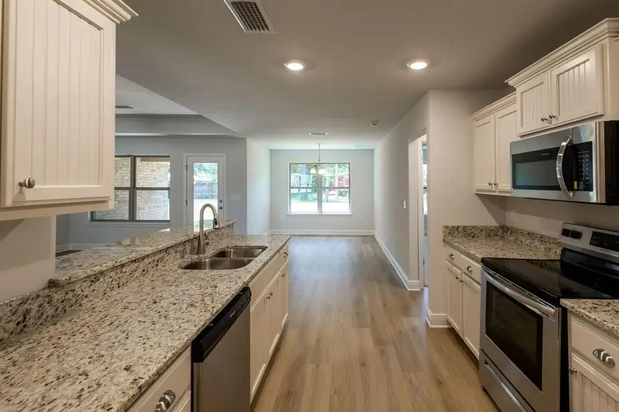 Representative furnished interior of a home built from the Plan 2005 by Adams Homes in Ashton View, Crestview (Image 4).