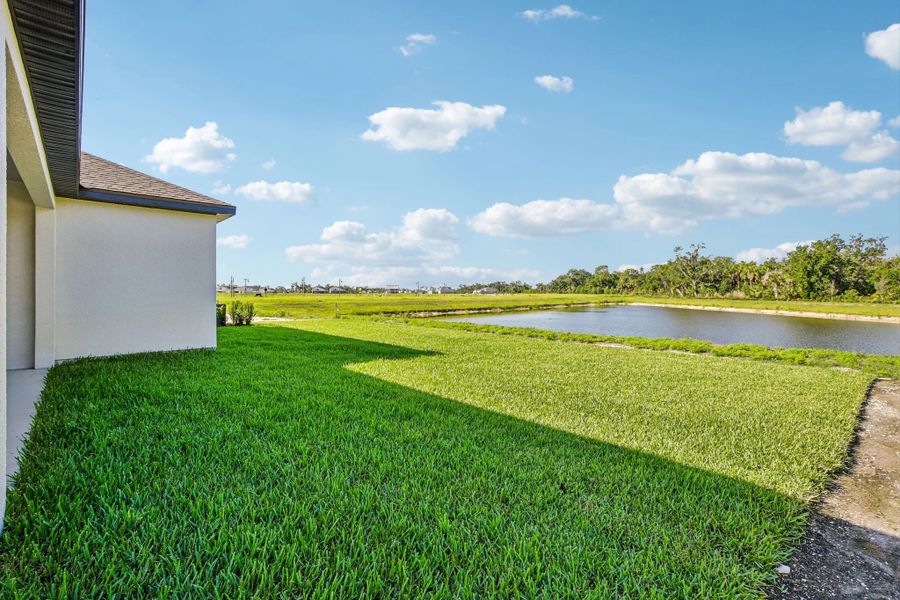 Stunning pond view from the spacious backyard