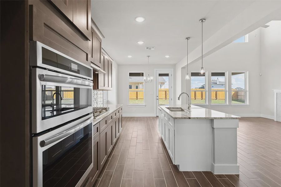 Furnished interior view inside a new home in The Grove at Blackhawk, Pflugerville (Image 9).