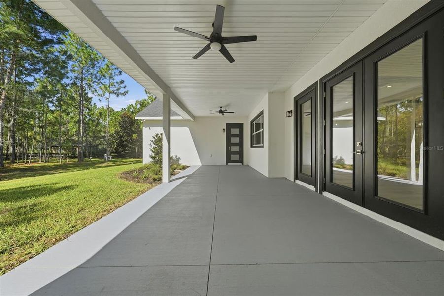 Exterior details and patio area of a home in , Wildwood (Image 32).
