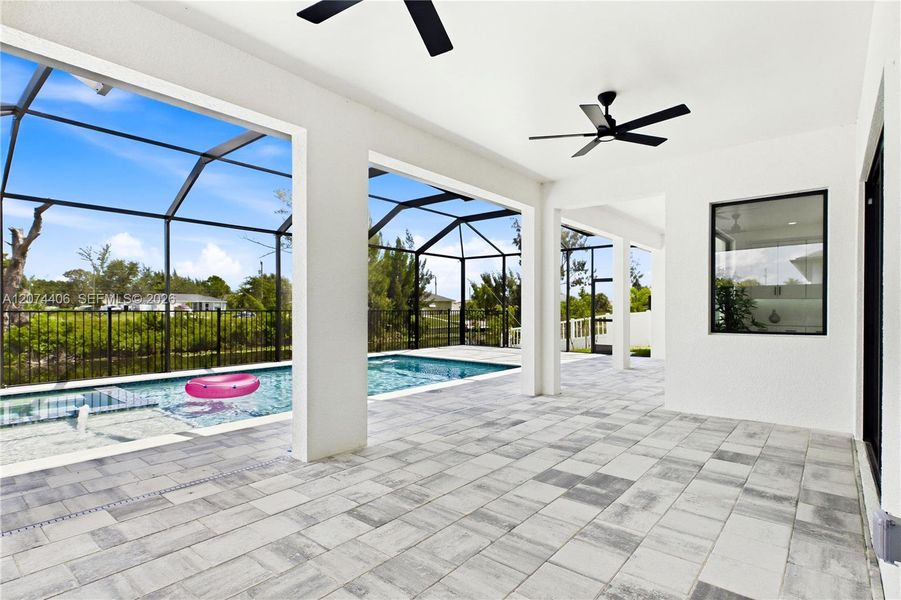CREATE YOUR OWN OUTDOOR OASIS—dine, entertain & unwind under the expansive COVERED LANAI while enjoying POOLSIDE BREEZES & the laid-back SWFL WATERFRONT LIFESTYLE! CREATE YOUR OWN OUTDOOR OASIS—dine, entertain & unwind under the expansive COVERED LANAI while enjoying POOLSIDE BREEZES & the laid-back SWFL WATERFRONT LIFESTYLE!