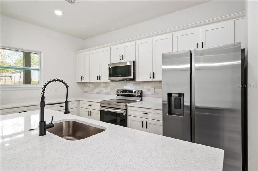Furnished interior view inside a new home in , Citrus Springs (Image 9).